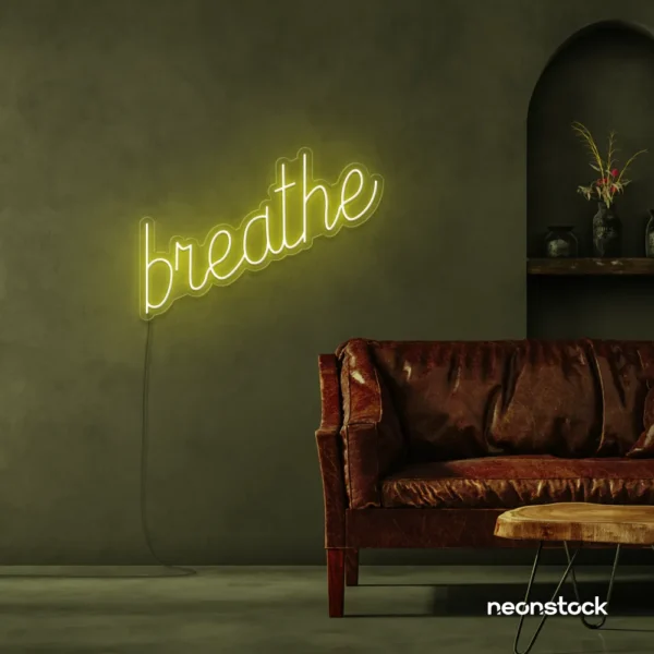 Breathe neon sign in lemon yellow for meditation rooms, yoga studios, and calming home decor.