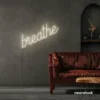 Breathe neon sign in neutral white for meditation rooms, yoga studios, and calming home decor.