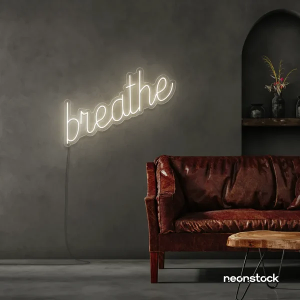 Breathe neon sign in neutral white for meditation rooms, yoga studios, and calming home decor.