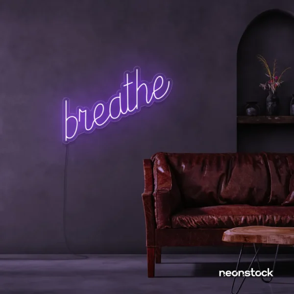 Breathe neon sign in purple for meditation rooms, yoga studios, and calming home decor.