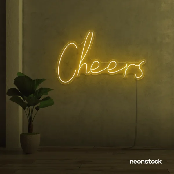 Cheers neon sign in golden yellow for weddings, parties, and event decor.