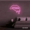 Drip lip neon sign in baby pink for glam rooms, modern wall art, and beauty salon decor.