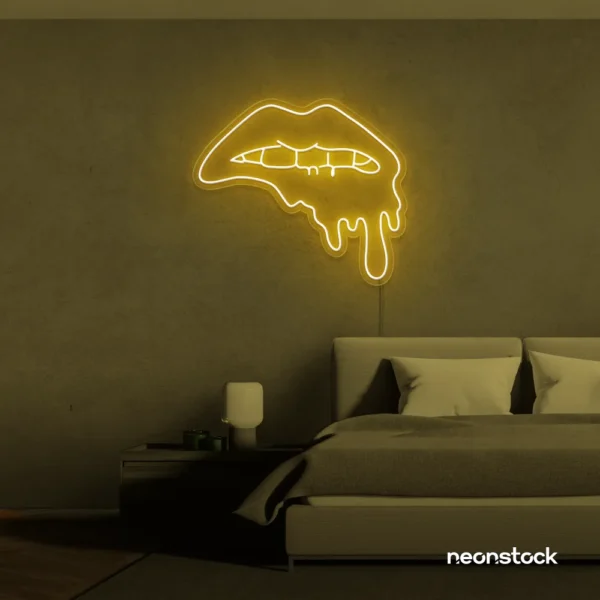 Drip lip neon sign in golden yellow for glam rooms, modern wall art, and beauty salon decor.