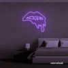 Drip lip neon sign in purple for glam rooms, modern wall art, and beauty salon decor.