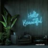Hello Beautiful neon sign in ice blue script font for salon styling walls and glam vanity decor.