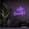 Hello Beautiful neon sign in purple script font for salon styling walls and glam vanity decor.