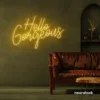 Hello Gorgeous neon sign in golden yellow for beauty salons, home vanity walls, and glam room decor.