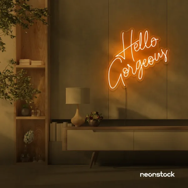 Hello Gorgeous neon sign (script font) in orange for salons, vanity walls, and glam rooms.