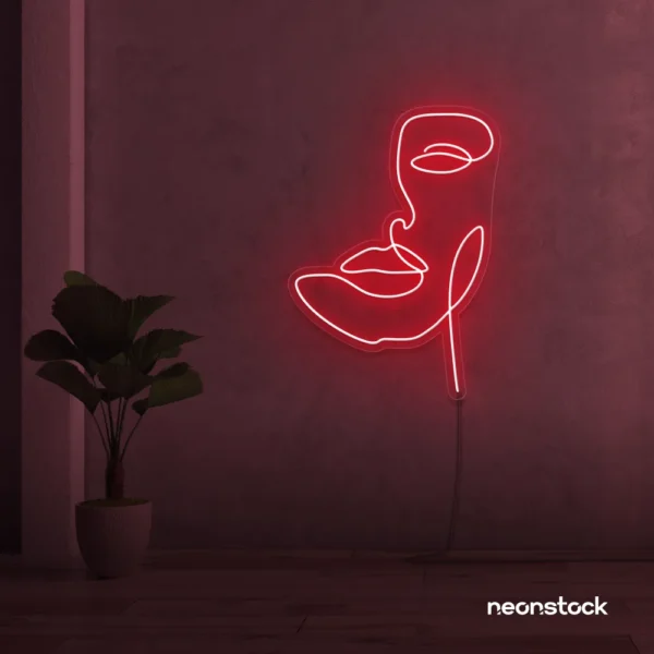 Abstract face neon sign in red for beauty salons, nail studios, and spa wall decor.