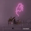 Abstract woman silhouette neon sign in baby pink for salons, studios, and feminine wall decor.