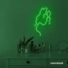 Abstract woman silhouette neon sign in deep green for salons, studios, and feminine wall decor.