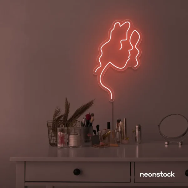 Abstract woman silhouette neon sign in peachy pink for salons, studios, and feminine wall decor.