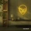 Alien neon sign in golden yellow for teen rooms and wall decor
