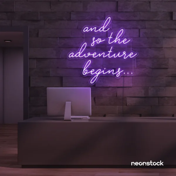 And So The Adventure Begins neon sign in purple for wedding decor, new beginnings, and celebration walls.