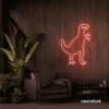 T-Rex dinosaur neon sign in peachy pink for kids' bedrooms, dino-themed decor, and playroom walls.