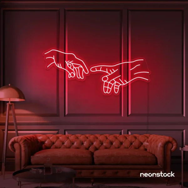 Hands neon sign in red – modern wall art symbolizing connection and emotion.