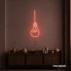 Hanging bulb neon sign in peachy pink for cafes, offices, and creative spaces.