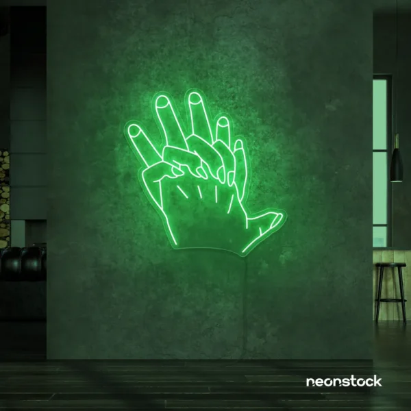 Holding hands neon sign in green – emotional LED wall decor.