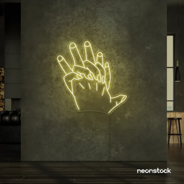 Holding hands neon sign in warm white – emotional LED wall decor.