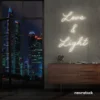 Love and Light neon sign in neutral white for weddings, romantic decor, and celebration backdrops.