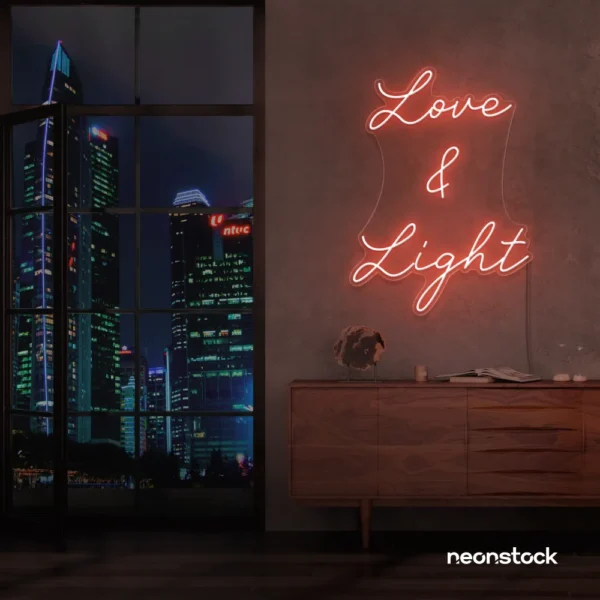 Love and Light neon sign in peachy pink for weddings, romantic decor, and celebration backdrops.