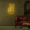 Peace neon sign in golden yellow for wall decor