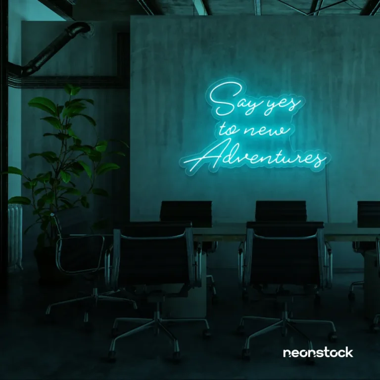 Say Yes to New Adventures neon sign in mint green for travel decor, modern entryways, and motivational vibes.