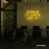 Screw It Let's Do It neon sign in golden yellow for fearless office decor, bold bedroom walls, and startup energy.