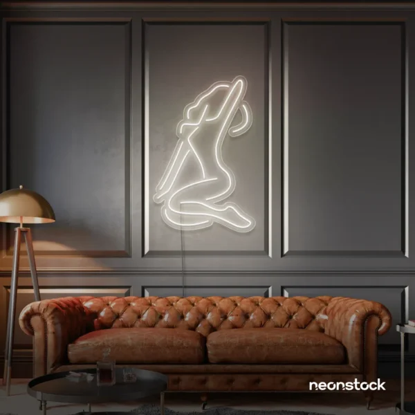 Sitting woman neon sign in neutral white for minimalist wall art and feminine home decor.