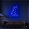 Sitting woman neon sign in dark blue for minimalist wall art and feminine home decor.