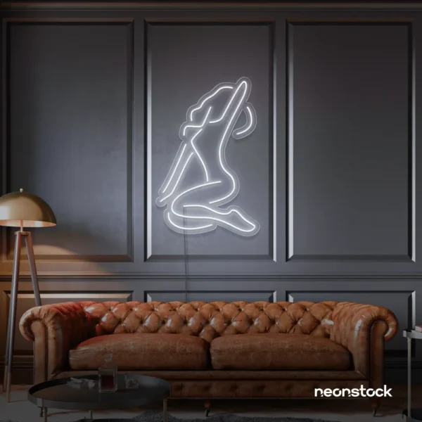 Sitting woman neon sign in white for minimalist wall art and feminine home decor.