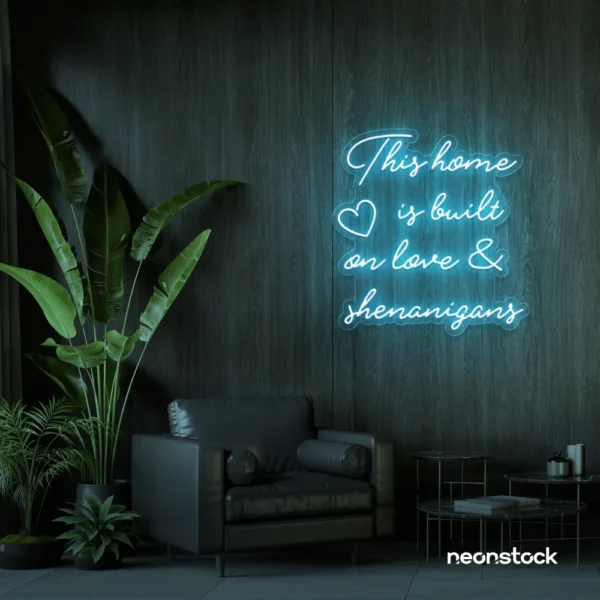 This Home Is Built on Love and Shenanigans neon sign in ice blue for family walls, living rooms, and cozy decor.