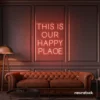 This Is Our Happy Place neon sign in peachy pink for home entryways, cozy rooms, and joyful wall decor.