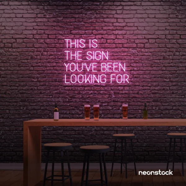 This Is The Sign You’ve Been Looking For neon sign in baby pink for modern wall decor and motivational rooms.