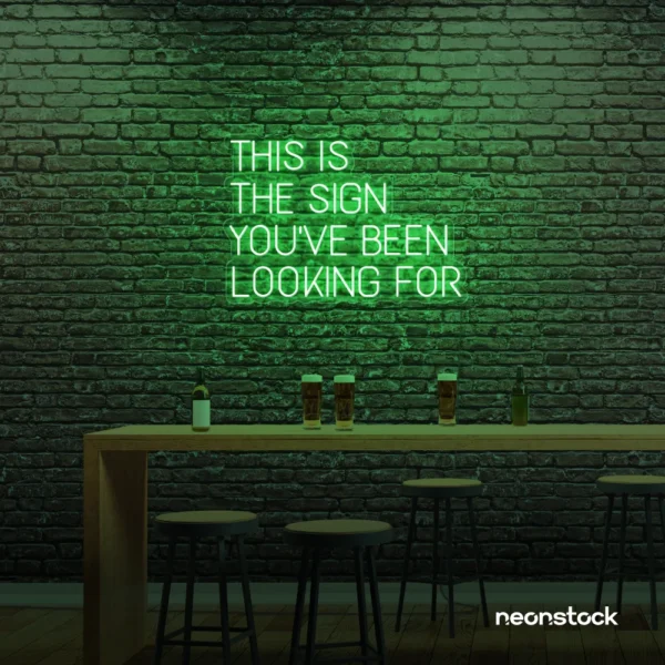 This Is The Sign You’ve Been Looking For neon sign in green for modern wall decor and motivational rooms.
