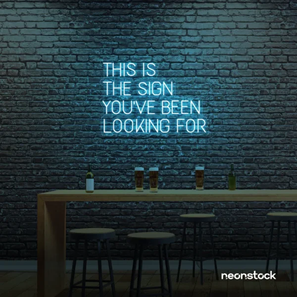This Is The Sign You’ve Been Looking For neon sign in ice blue for modern wall decor and motivational rooms.