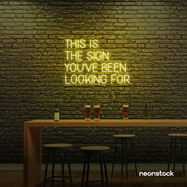 This Is The Sign You’ve Been Looking For neon sign in lemon yellow for modern wall decor and motivational rooms.