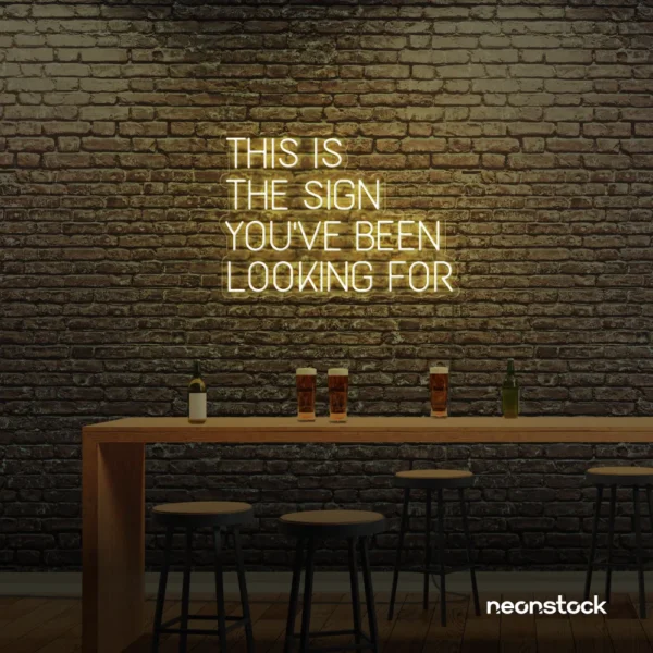 This Is The Sign You’ve Been Looking For neon sign in warm white for modern wall decor and motivational rooms.