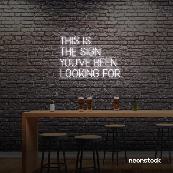 This Is The Sign You’ve Been Looking For neon sign in white for modern wall decor and motivational rooms.