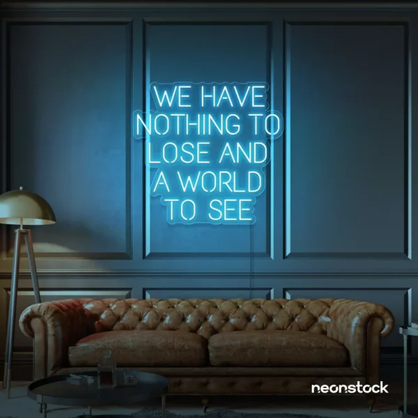 We Have Nothing to Lose and a World to See neon sign in ice blue for travel wall art and decor lovers.