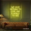 We Have Nothing to Lose and a World to See neon sign in lemon yellow for travel wall art and decor lovers.