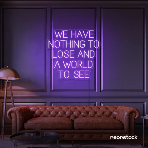 We Have Nothing to Lose and a World to See neon sign in purple for travel wall art and decor lovers.