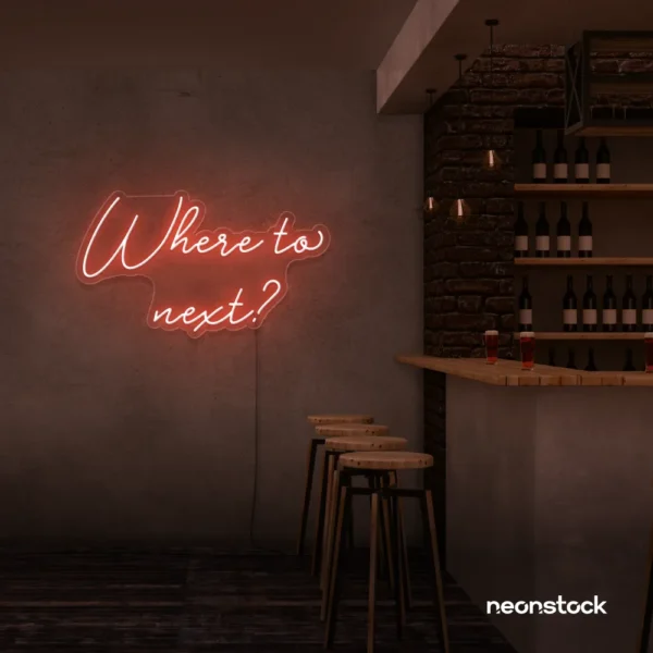 Where To Next neon sign in peachy pink