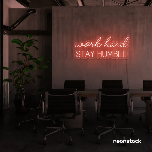 Work Hard Stay Humble neon sign in peachy pink for success-driven decor, workspaces, and personal growth rooms.