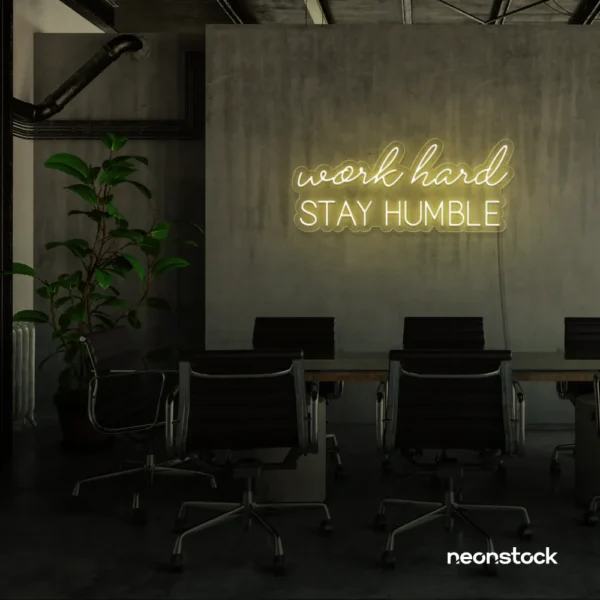 Work Hard Stay Humble neon sign in warm white for success-driven decor, workspaces, and personal growth rooms.