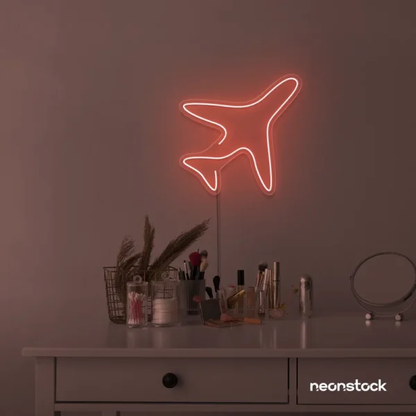 Aeroplane neon sign in peachy pink for kids' rooms, nursery travel themes, and pilot-inspired decor.