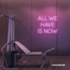 All We Have Is Now neon sign in baby pink for modern wall decor, dorms, and cozy interiors.