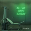 All We Have Is Now neon sign in green for modern wall decor, dorms, and cozy interiors.