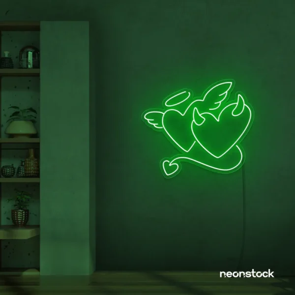 Devil and angel heart neon sign in deep green for romantic and edgy room decor.