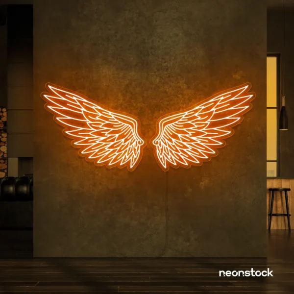 Elegant angel wings neon sign in peachy pink for wall art or restaurant decor.